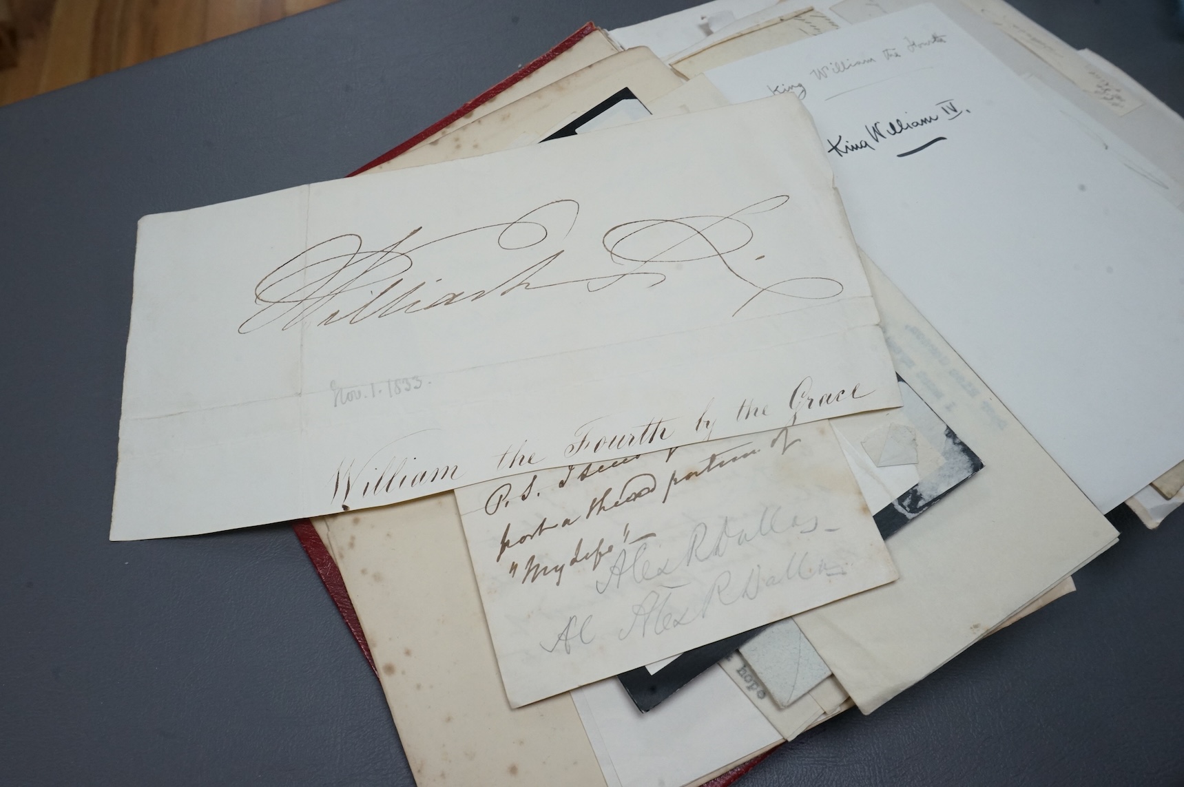A Victorian autograph book containing a collection of complete letters, partial letters and cut out signatures from leading and influential figures primarily from the second half of the nineteenth century, many of the ex